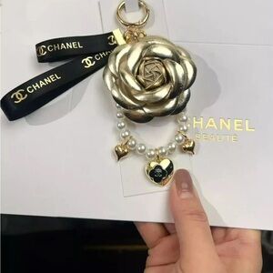 🆕 Chanel Gold Rose Keychain with Pearls and Heart Charms